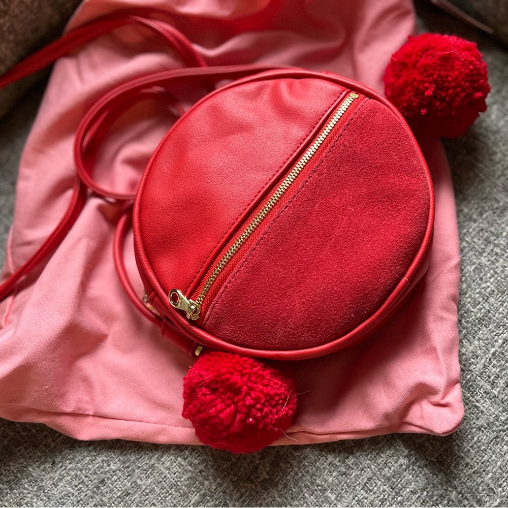 ban.dō red leather cross body bag with poms
